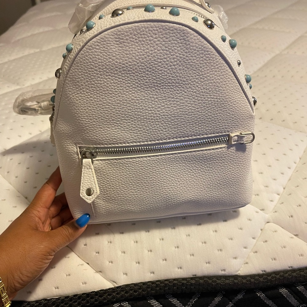 Super cute Trendy Sam Edelman backpack ( mini)